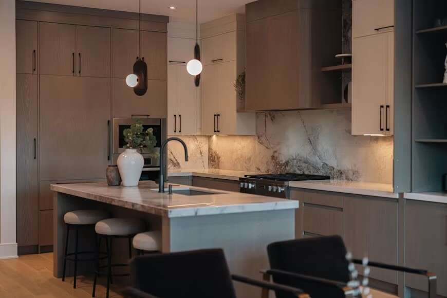 Modern Kitchen With Island And Marble Backsplash
